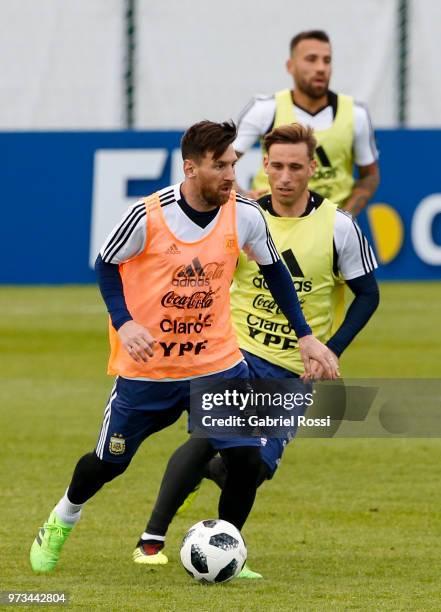 Lionel Messi of Argentina drives the ball during an open to public training session at Bronnitsy Training Camp on June 11, 2018 in Bronnitsy, Russia.