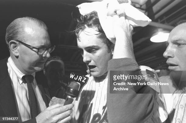 Pitcher Nolan Ryan, who won in relief, sops up champagne and tells 'em how he did it after the third game against the Atlanta Braves at Shea made the...