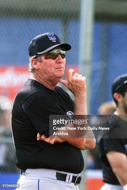 Pitching coach Charlie Hough supervises a workout at the New York Mets' spring training camp in Port St. Lucie, Fla.