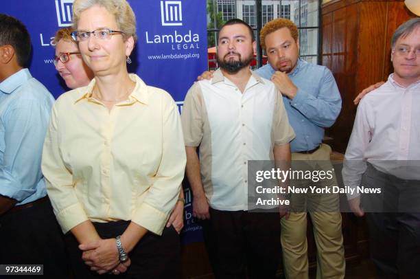 Plaintiffs Mary Jo Kennedy, Jo-Ann Shain, Daniel Reyes, Curtis Woolbright and Michael Elsasser wait at St. Bartholomew's Church to hear the court's...