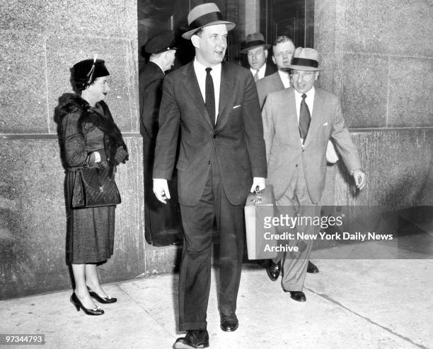 Preceded by attorney, Frank Costello leaves Federal Court after hearing Judge John F. X. McGobey relate how jury in the gambler's 1954 tax trail was...
