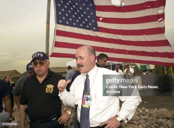 Police Commissioner Bernard Kerik tours Fresh Kills landfill in Staten Island, where the remains of the fallen World Trade Center's twin towers are...