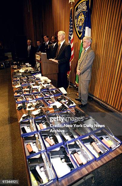 Police Commissioner Howard Safir at press conference at police headquarters where he displayed 87 guns seized by police.