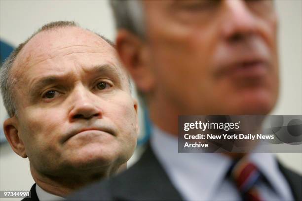 Police Commissioner Raymond Kelly looks on as Mayor Michael Bloomberg speaks during a news conference at Jacobi Medical Center in the Bronx after...