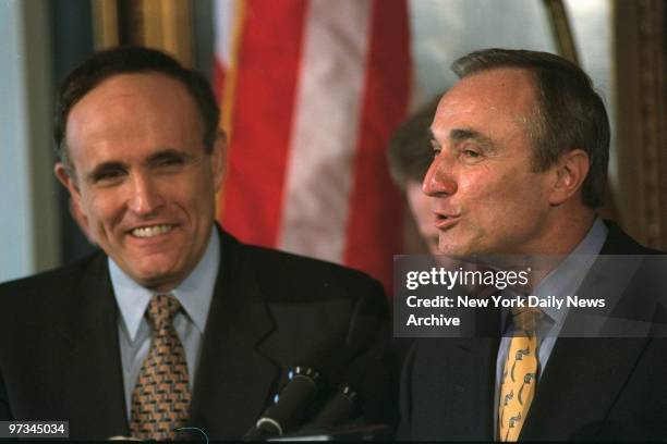 Police Commissioner William Bratton announcing resignation with Mayor Rudy Giuliani at City Hall.