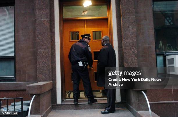 Police enter an apartment building at 31 Downing St. Where Vado Diomande, a drum-maker who was infected with anthrax, lives. Diomande who is also a...
