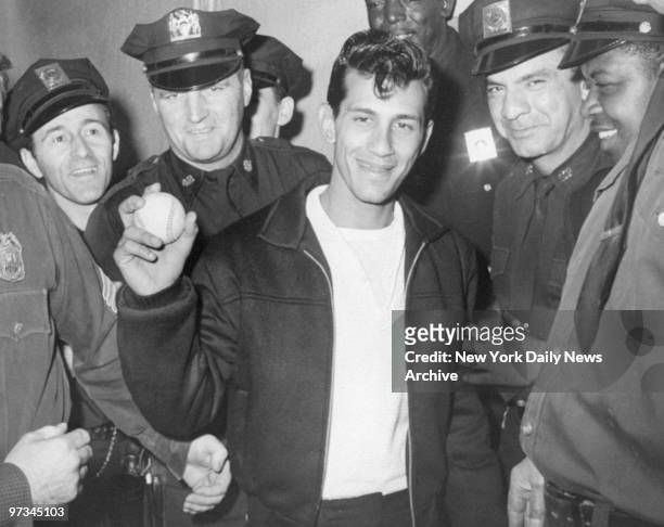 Police escort Sal Durante from stands after he caught Roger Maris' 61st homerun ball during the Boston Red Sox and New York Yankees game on October...