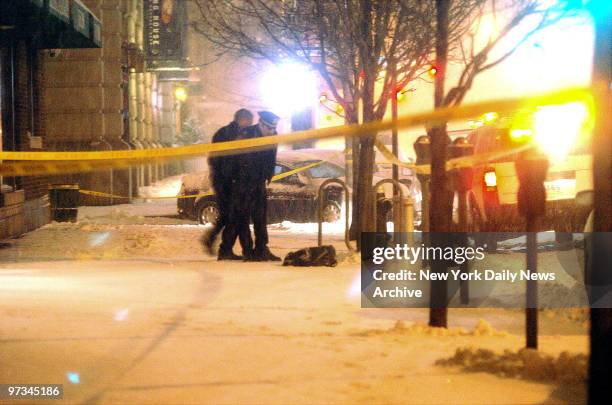 Police investigate scene outside Hot 97 radio station at 395 Hudson St. Where a member of rapper 50 Cent's entourage was shot in the leg.