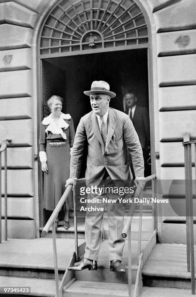 President Franklin D. Roosevelt leaves his home at 49 East 65th Street for a short visit to his family estate at Hyde Park, north of New York City....