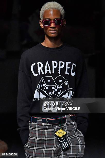 Model walks the runway at the Liam Hodges Spring/Summer 2019 fashion show during London Fashion Week Men's June 2018 on June 9, 2018 in London,...
