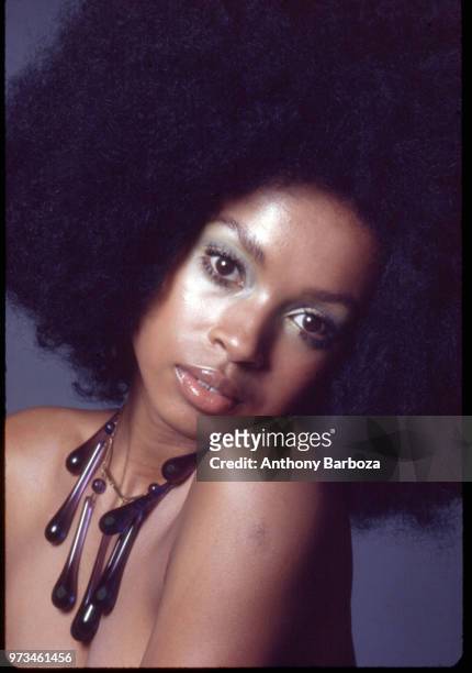 Portrait of an unidentified female model with an oversize necklace and an Afro hairstyle, New York, 1968.