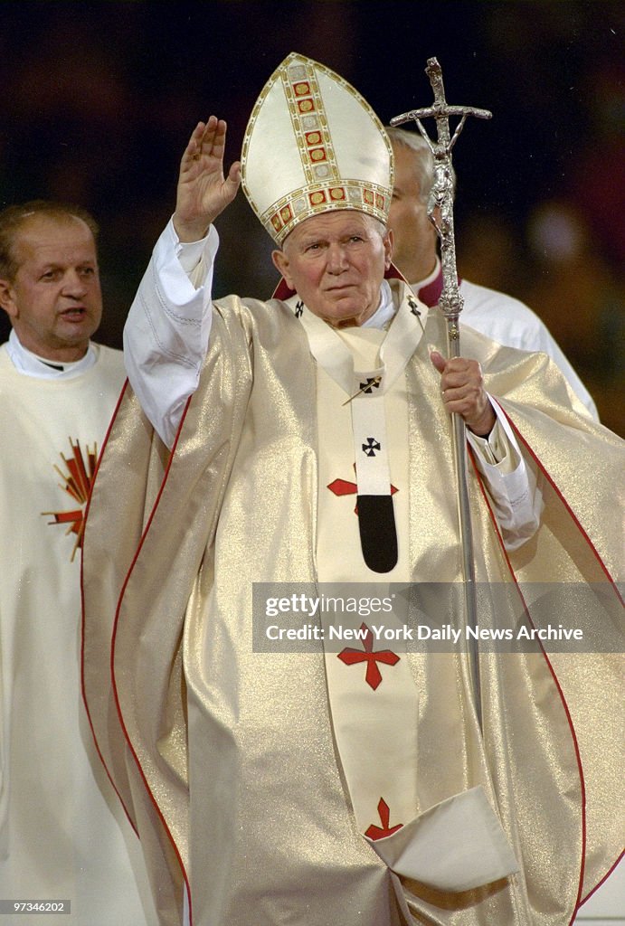 Pope John Paul II waves to crowd at Giants Stadium.