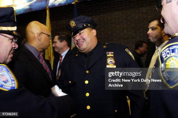 Port Authority Detective Will Jimeno, one of the last people rescued from the rubble of the World Trade Center, says goodbye to his friends after...