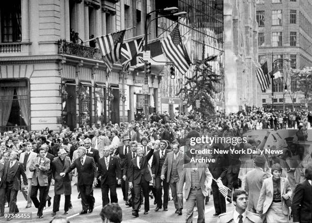 President Jimmy Carter marching up Fifth Ave. During the Columbus Day parade. Among the marchers are Gov. Mario Cuomo, Mayor Ed Koch, and Sen. Daniel...