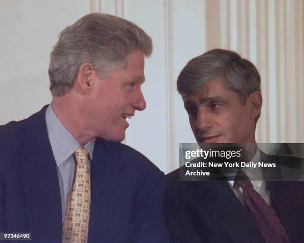 President Bill Clinton and Treasury Secretary Robert Rubin during an event in the East Room of the White House.