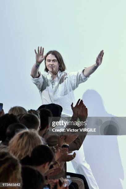 Fashion designer Alex Mullins walks the runway at the Alex Mullins Spring/Summer 2019 fashion show during London Fashion Week Men's June 2018 on June...