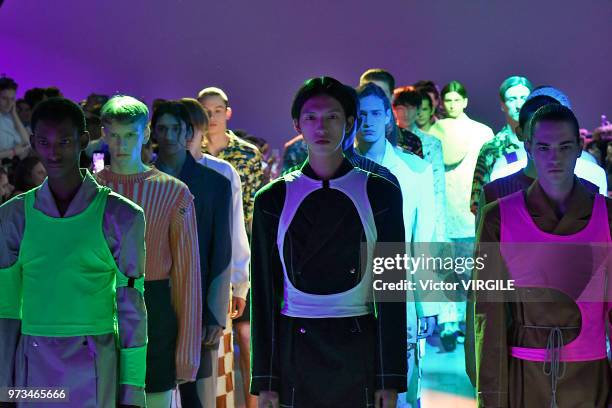 Model walks the runway at the Alex Mullins Spring/Summer 2019 fashion show during London Fashion Week Men's June 2018 on June 10, 2018 in London,...