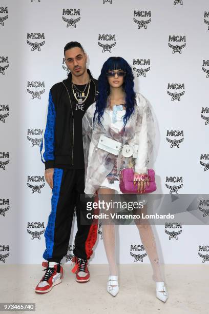 Marracash and Sita Abellan attend the MCM Fashion Show Spring/Summer 2019 during the 94th Pitti Immagine Uomo on June 13, 2018 in Florence, Italy.
