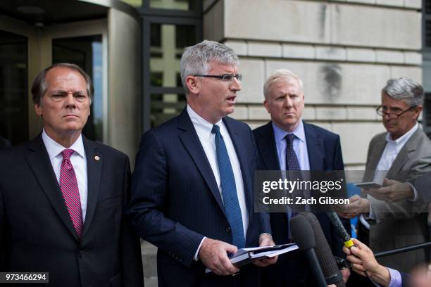 Benjamin Klubes, attorney for former Director of Security for the Senate Intelligence Committee James Wolfe speaks to members of the media outside of...