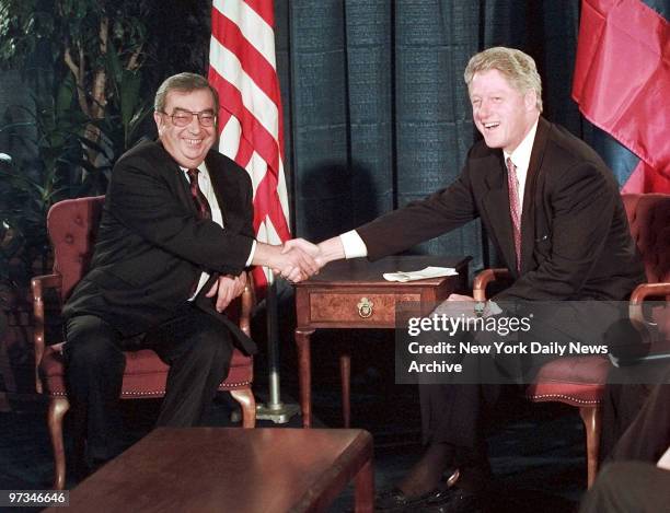 President Bill Clinton shakes hands with Russian Foreign Minister Yevgeny Primakov after Clinton addressed the United Nations General Assembly.