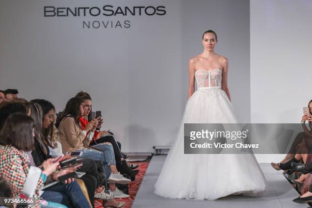 Model walks the runway wearing Benito Santos brides collection during the Mexico Bridal Show by Vogue at Four Seasons hotel on June 13, 2018 in...
