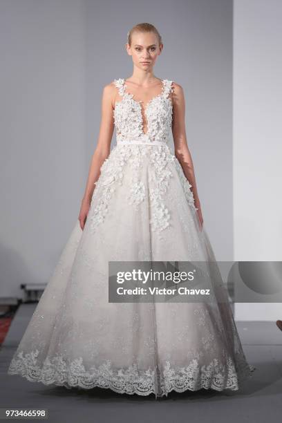 Model walks the runway wearing Benito Santos brides collection during the Mexico Bridal Show by Vogue at Four Seasons hotel on June 13, 2018 in...