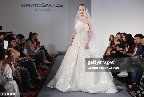 Model walks the runway wearing Benito Santos brides collection during the Mexico Bridal Show by Vogue at Four Seasons hotel on June 13, 2018 in...