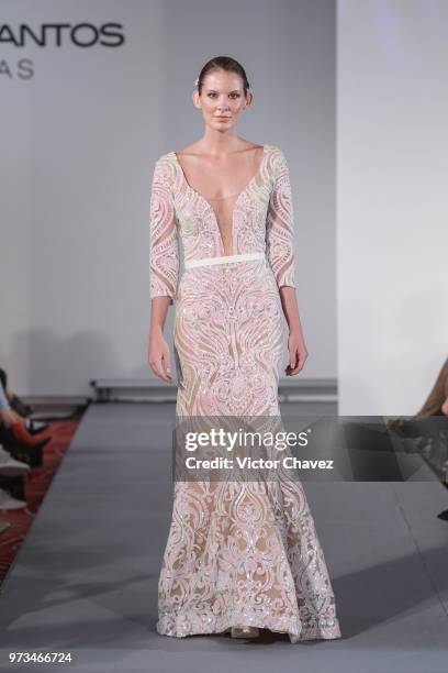 Model walks the runway wearing Benito Santos brides collection during the Mexico Bridal Show by Vogue at Four Seasons hotel on June 13, 2018 in...