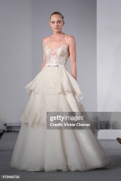 Model walks the runway wearing Benito Santos brides collection during the Mexico Bridal Show by Vogue at Four Seasons hotel on June 13, 2018 in...