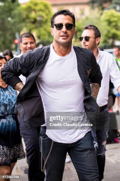 Fabrizio Corona, wearing white t-shirt and blue jacket, is seen during the 94th Pitti Immagine Uomo at Fortezza Da Basso on June 13, 2018 in...