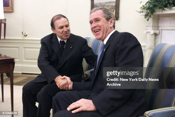 President George W. Bush meets with Algerian President Abdelaziz Bouteflika in the Oval Office of the White House. The two discussed Algeria's...