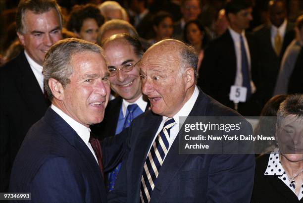 President George W. Bush is greeted by former Mayor Ed Koch as Schools Chancellor Harold Levy looks on at the Wall Street Regent Hotel, where Bush...