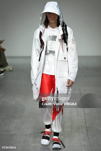 Model walks the runway at the Christopher Raeburn Spring/Summer 2019 fashion show during London Fashion Week Men's June 2018 on June 10, 2018 in...