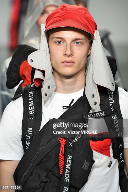 Model walks the runway at the Christopher Raeburn Spring/Summer 2019 fashion show during London Fashion Week Men's June 2018 on June 10, 2018 in...