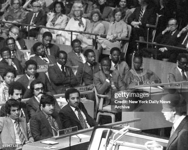 President Jimmy Carter speaks to members of the United Nations General Assembly during address on arms control and the mideast. In box seats on top...