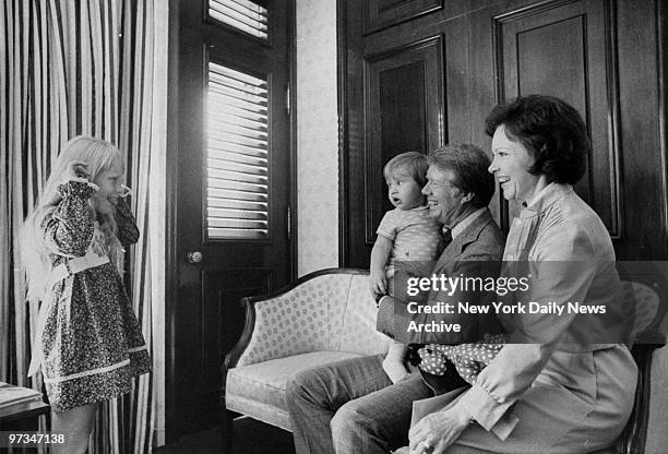 President Jimmy Carter with grandson Jason, wife Rosalynn and daughter Amy.