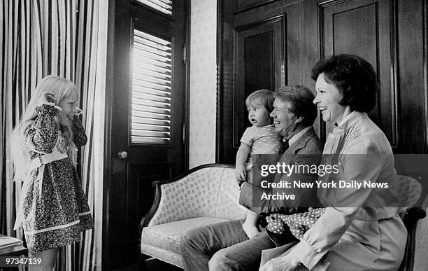President Jimmy Carter with grandson, Jason, wife, Rosalynn, and daughter, Amy, at the Americana Hotel.