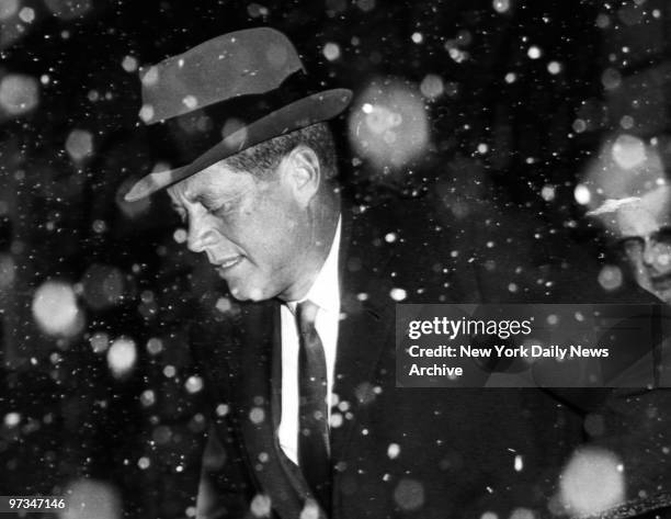 President John F. Kennedy in the snow during his inauguration week.