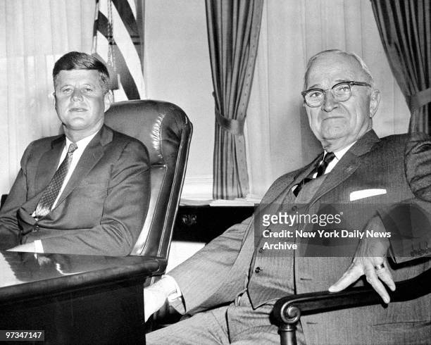 President John F. Kennedy is joined by former President Harry S. Truman in the Oval Office.