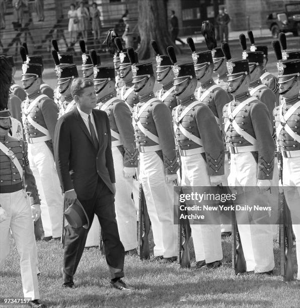 President John F. Kennedy, a Navy man himself, reviews West Point Cadets during graduation ceremonies