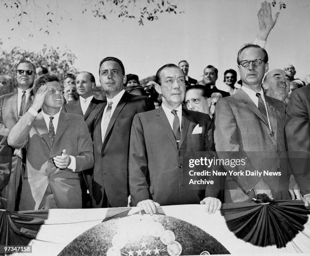 President John F. Kennedy, Fortune Pope, Mayor Robert Wagner and Robert Morganthau on the reviewing stand at the Columbus Day Parade along Fifth...