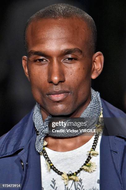 Model walks the runway at the Oliver Spencer Spring/Summer 2019 fashion show during London Fashion Week Men's June 2018 on June 9, 2018 in London,...