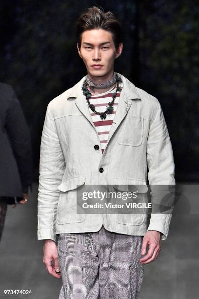 Model walks the runway at the Oliver Spencer Spring/Summer 2019 fashion show during London Fashion Week Men's June 2018 on June 9, 2018 in London,...