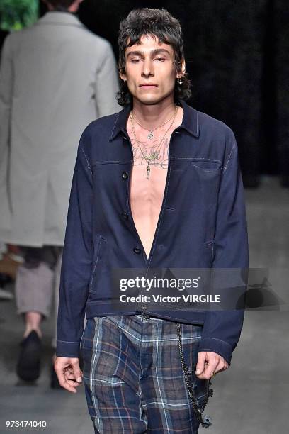 Model walks the runway at the Oliver Spencer Spring/Summer 2019 fashion show during London Fashion Week Men's June 2018 on June 9, 2018 in London,...