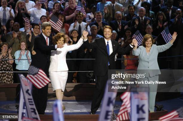 Presidential candidate Sen. John Kerry, his wife, Teresa Heinz Kerry, Kerry's running mate, Sen. John Edwards, and his wife, Elizabeth , bask in...