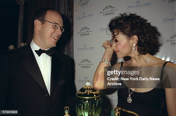 Prince Albert and Ashley Judd on hand at the Waldorf-Astoria where they unveiled the Grace de Monaco Parfum Collection by Faberge to benefit the...