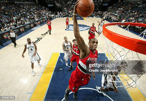 Dante Cunningham of the Portland Trail Blazers dunks against the Memphis Grizzlies on March 1, 2009 at FedExForum in Memphis, Tennessee. NOTE TO...