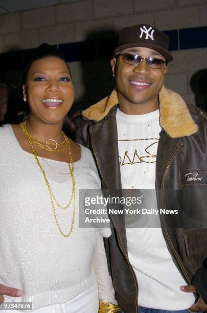 Queen Latifah is joined by her co-star, LL Cool J, as she returns to her hometown of Newark, N.J., for the premiere of her movie "Last Holiday" at...
