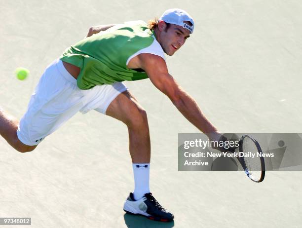 Robby Ginepri of the United States goes to his backhand for a return shot during his third-round 2007 U.S. Open match against Stanislas Wawrinka of...