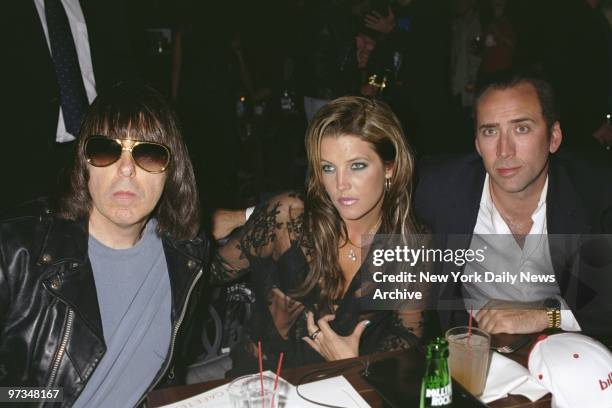 Punk rocker Johnny Ramone, Lisa Marie Presley and boyfriend Nicolas Cage get together at the Hudson Hotel on W. 58th St. For a party thrown by...